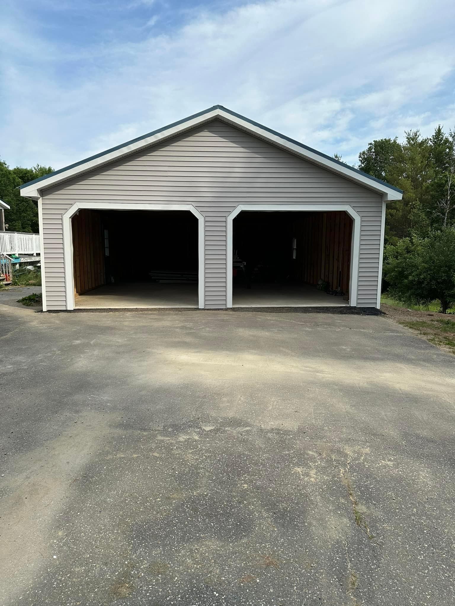 two bay garage with vinyl siding