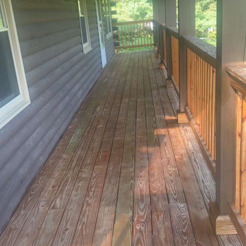 A bathroom with a toilet a sink and a mirror
