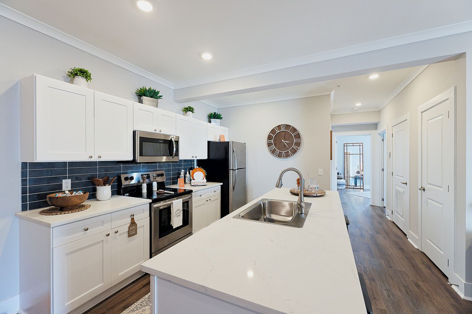 Pointe Grand Kingsland East Apartment Homes designer kitchen with oversized island.