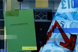 a book is sitting on top of a stack of money in front of a building .