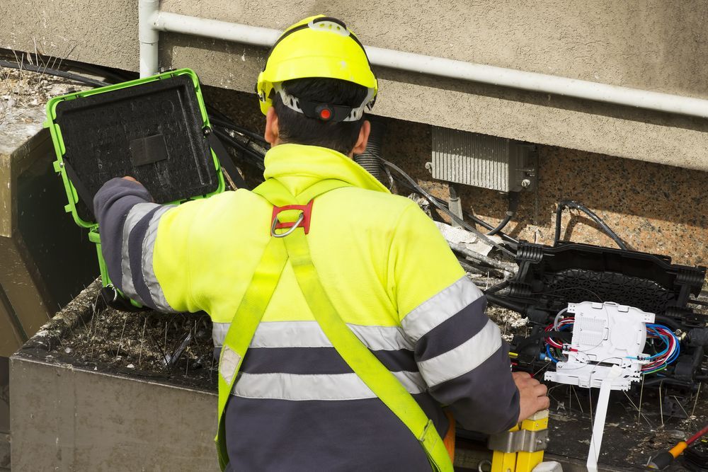 A Man is Working on a Server in a Data Center — Frontier Connect in Warwick, QLD