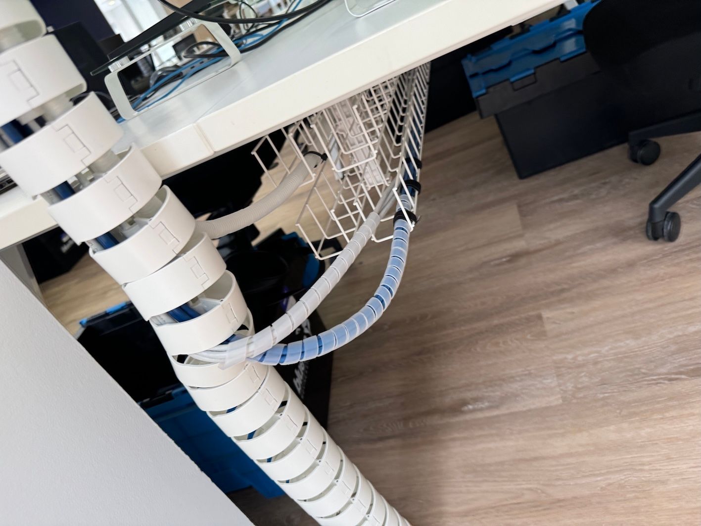 Corner Of School Desk With Secured Cables — Frontier Connect in Newtown, QLD