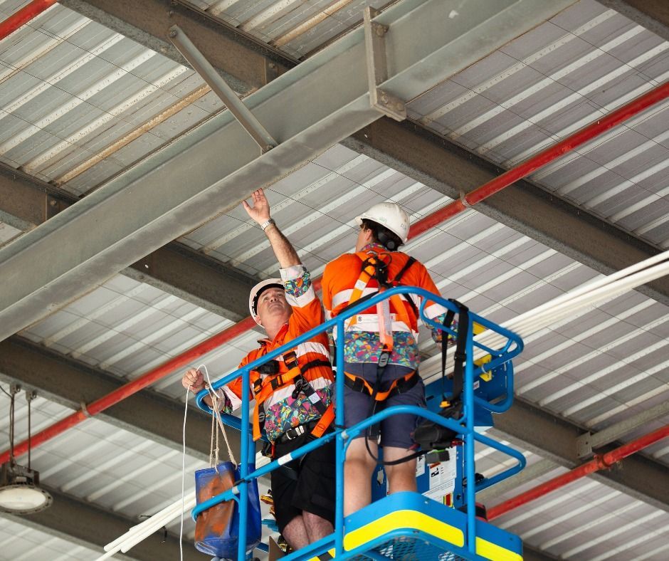 2 Workmen On A Cherry Pickup Cabling — Frontier Connect in Newtown, QLD