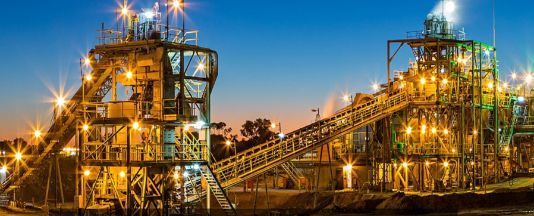 Industrial Plant Lit Up at Dusk — Forcequip Hire In Glanmire, QLD