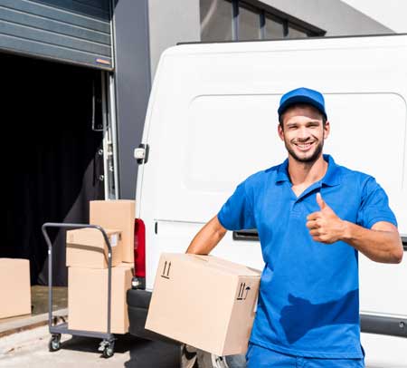 Delivery man with box — Furniture Removals in Dubbo, NSW