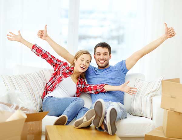 Smiling couple — Removalist in Dubbo, NSW Smiling couple — Removalist in Dubbo, NSW