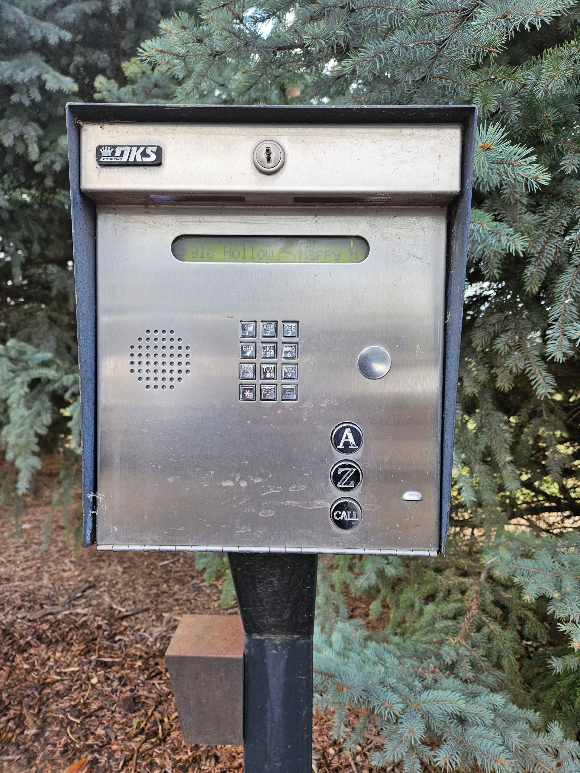 A silver box with the word king on it