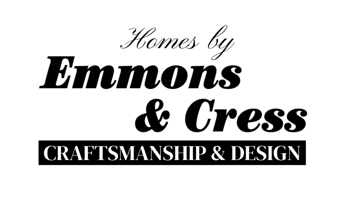 A black and white logo for homes by emmons & cress craftsmanship and design.