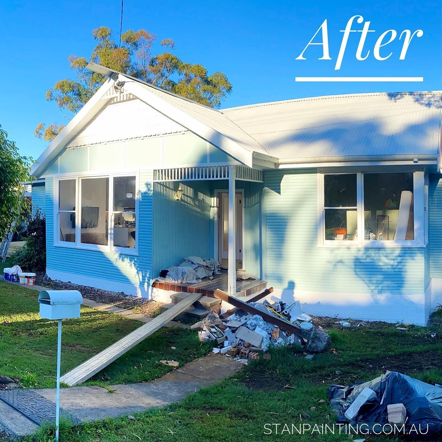 Blue House After Exterior Renovation — Stan Painting Services In Kurri Kurri, NSW