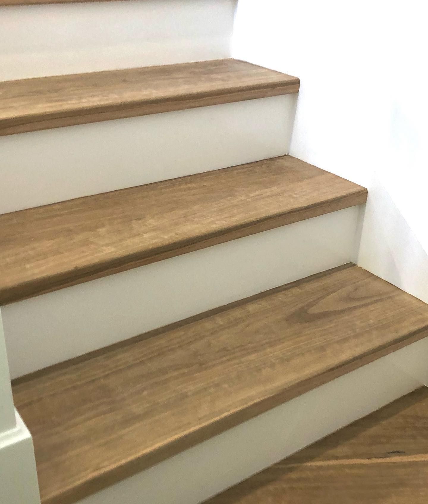Wooden stair treads with white risers — Stan Painting Services In Thornton, NSW