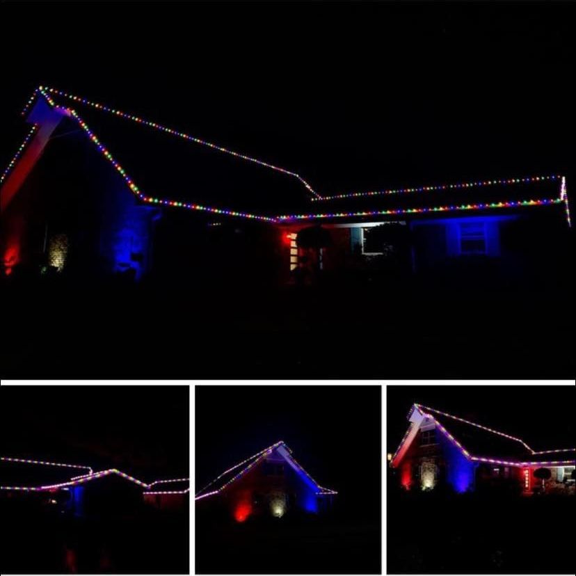 A house with a large lawn in front of it