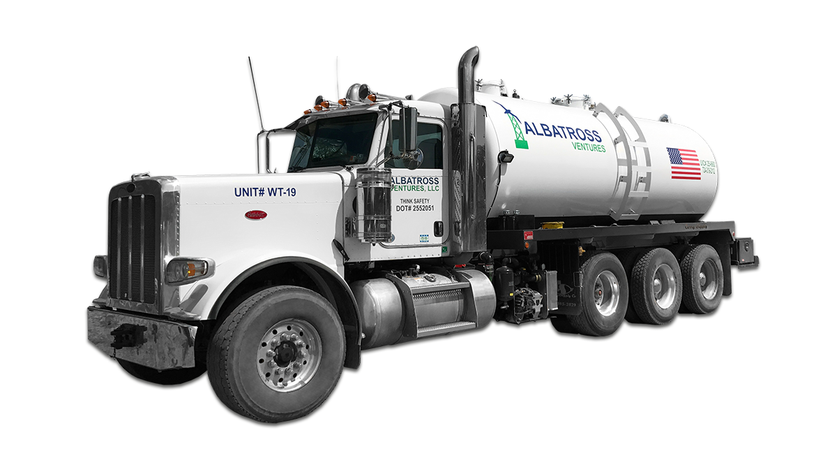 A white vacuum truck with an american flag on the side is on a white background.