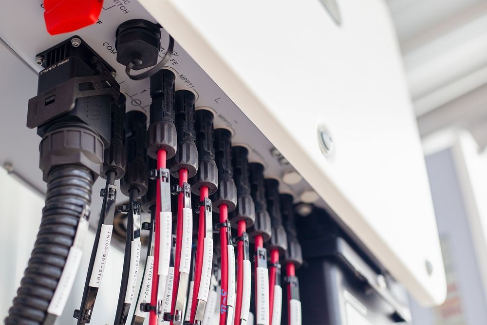 Solar Panel Inverter with Red and Black Cables Connected — SOLARCO Central West in Orange, NSW