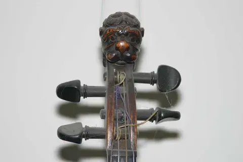 A Violin with Lion Head