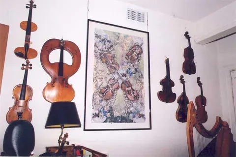Violin Collection Hanging on a Wall