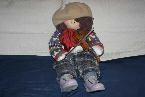 Doll Holding a Violin