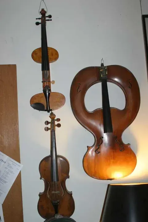 Two Violins Hanging on a Wall