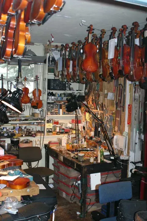A Shop with Lots of Violins A Shop with Lots of Violins