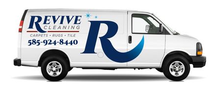 A white van with the word revive cleaning on it