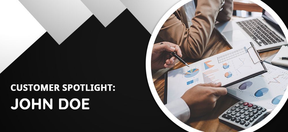 Customer spotlight: John Doe. Two people reviewing charts and a calculator.