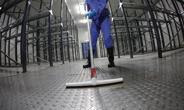 Mopping Warehouse Floor — Anderson, SC — CFL Facilities Services