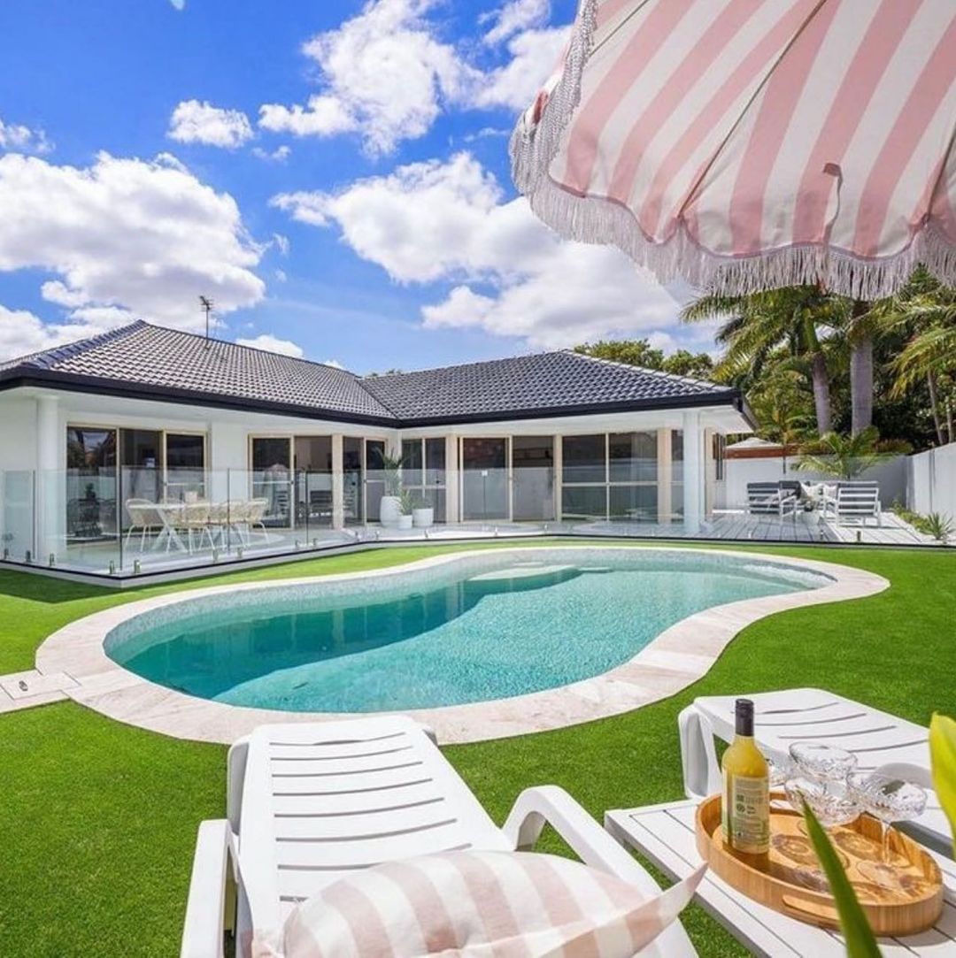 A Large Swimming Pool With A Tile Edging The Backyard — Amber North Coast In Port Macquarie, NSW