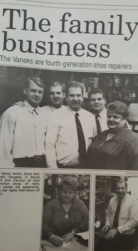 A black and white photo of a family business