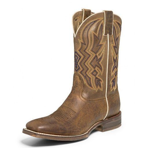A pair of brown cowboy boots on a white background