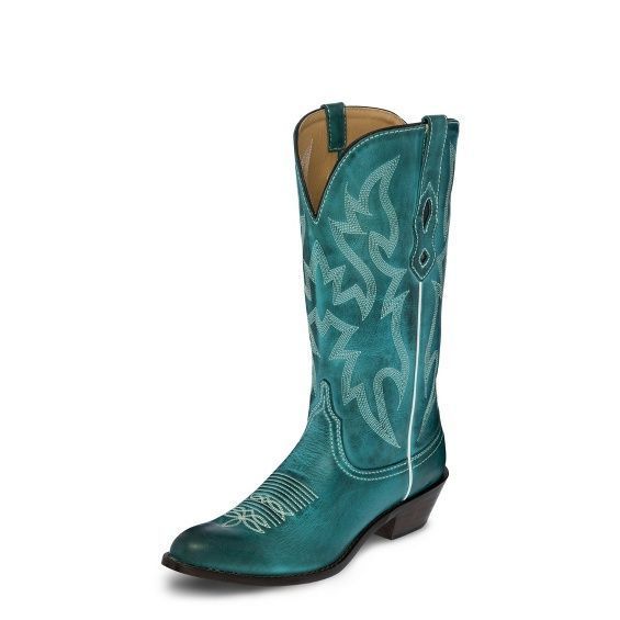 A pair of teal cowboy boots on a white background