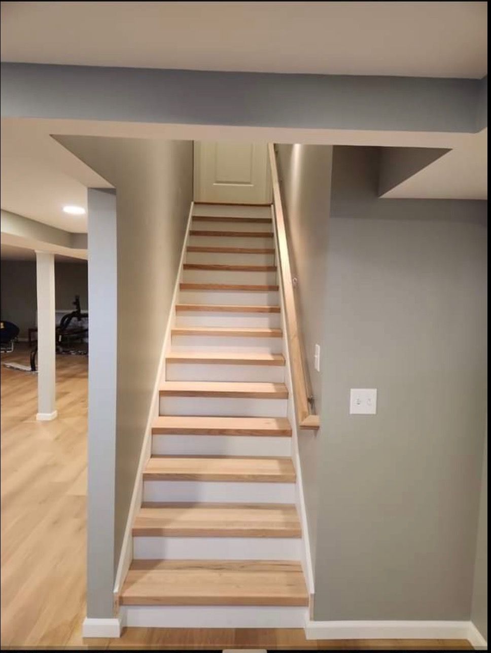 A set of stairs leading up to the second floor of a house