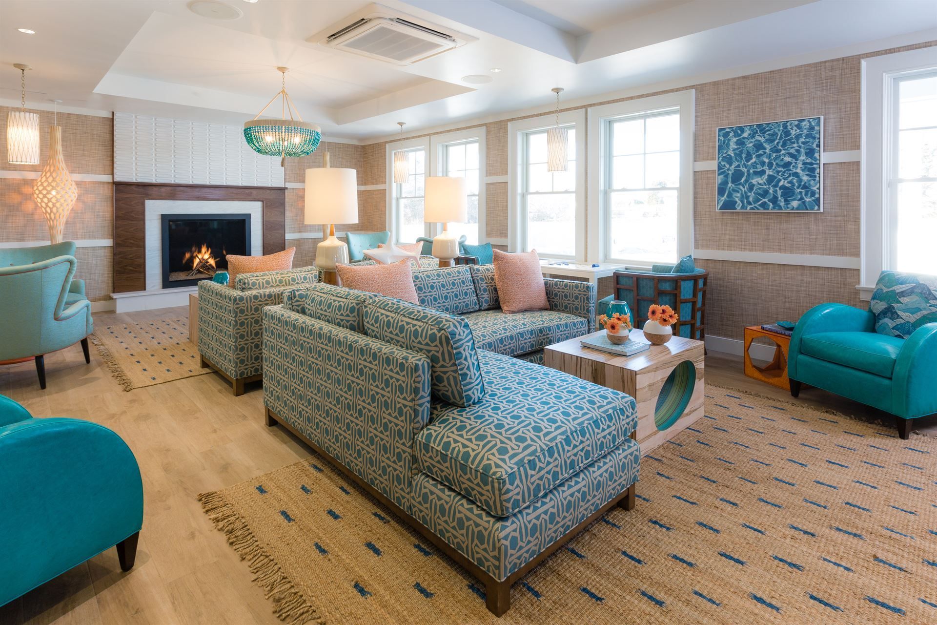 A living room filled with furniture and a fireplace.