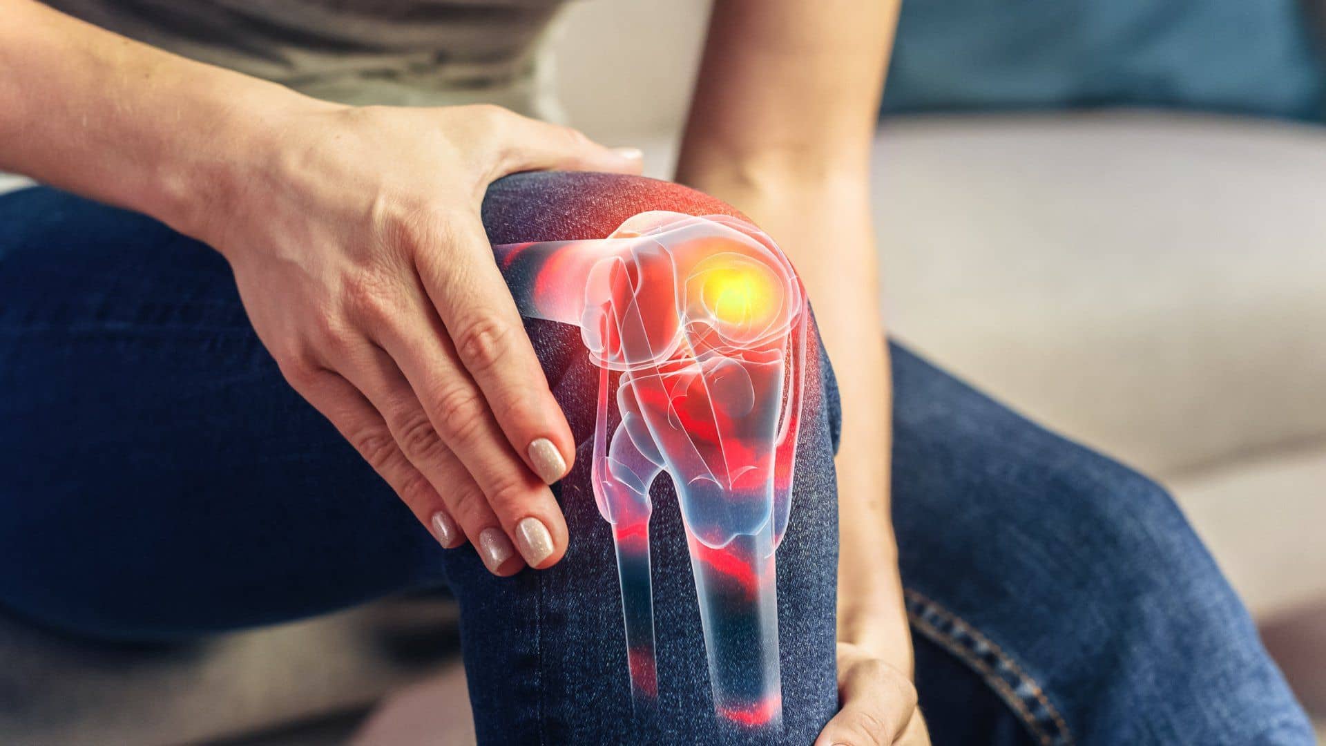 A woman grabbing her inflamed knee