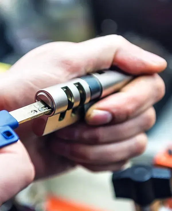 Man Fixing Mobile Door Lock