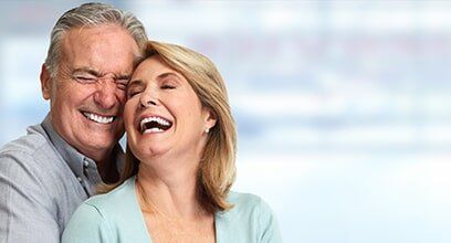 Old Couple Smiling — Prosthodontics in Beaumont, TX