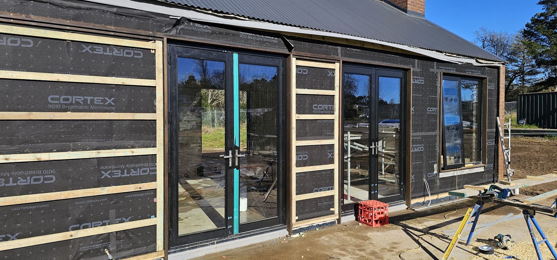 Urban Apartment Building — Builders Wrap in Southern Highlands