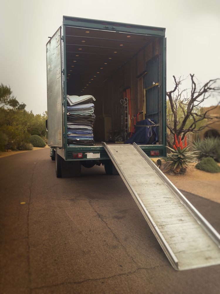 A Moving Truck With a Ramp Attached to It — Wide Bay Removals In Dundowran, QLD A Moving Truck With a Ramp Attached to It — Wide Bay Removals In Dundowran, QLD