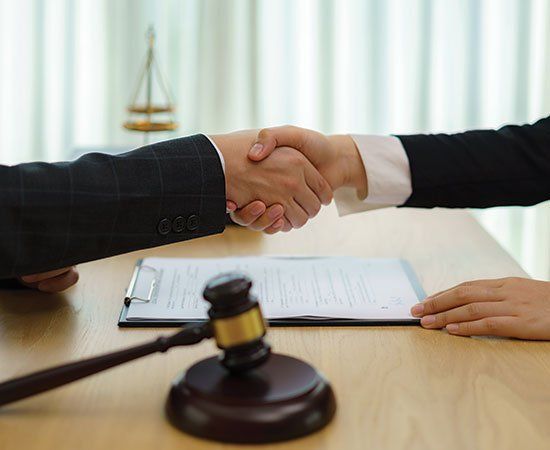 Shaking Hands — Eau Claire, WI — Law Offices Of Jeffrey Klemp LLC