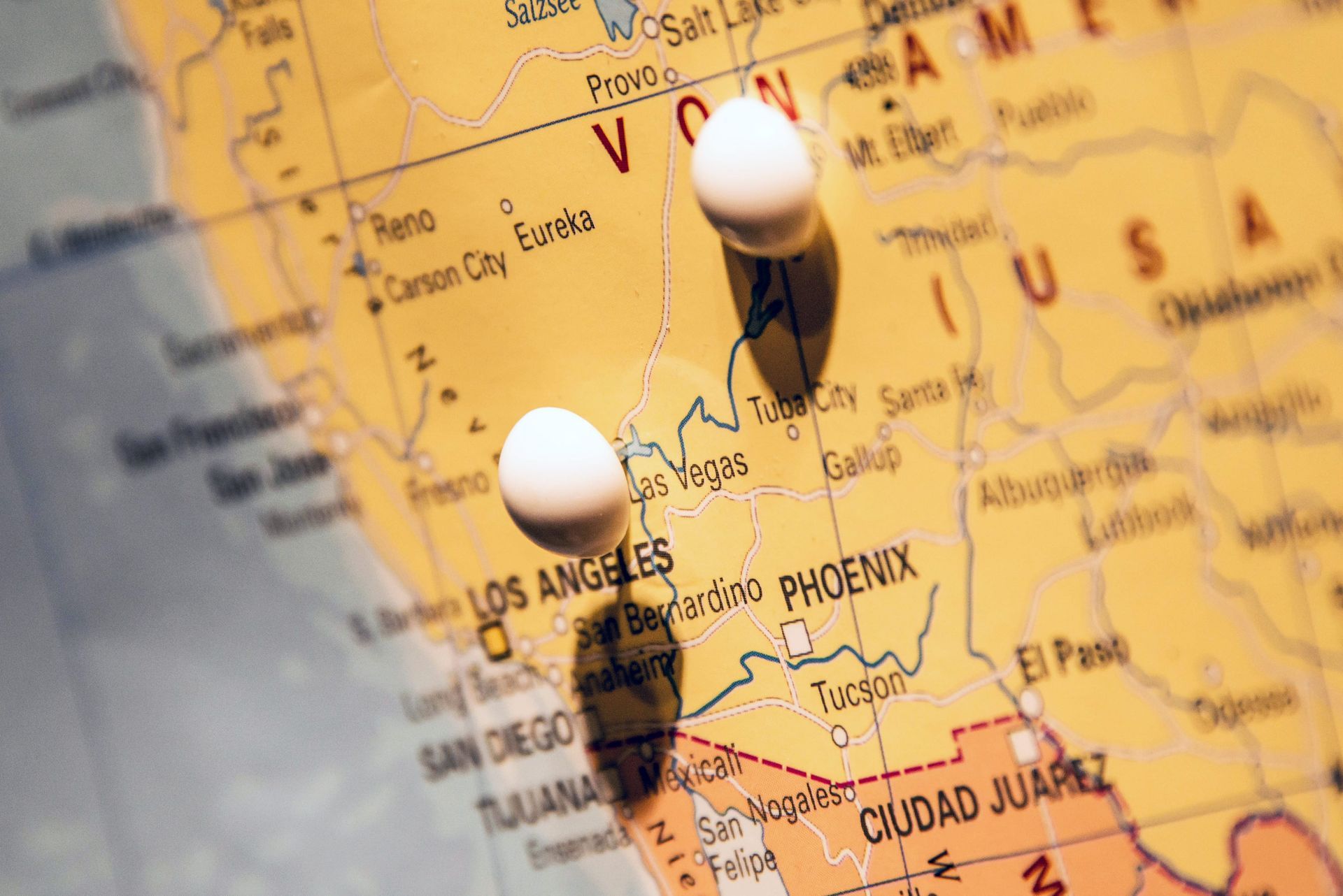 Pushpin marking Los Angeles on a U.S. map, with Mexico and the Southwest visible