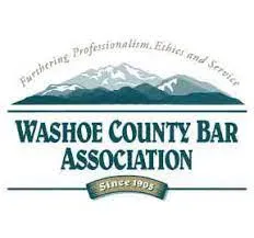 The logo for the washoe county bar association has a mountain in the background.