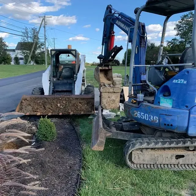 A blue excavator with the numbers 265039 on it