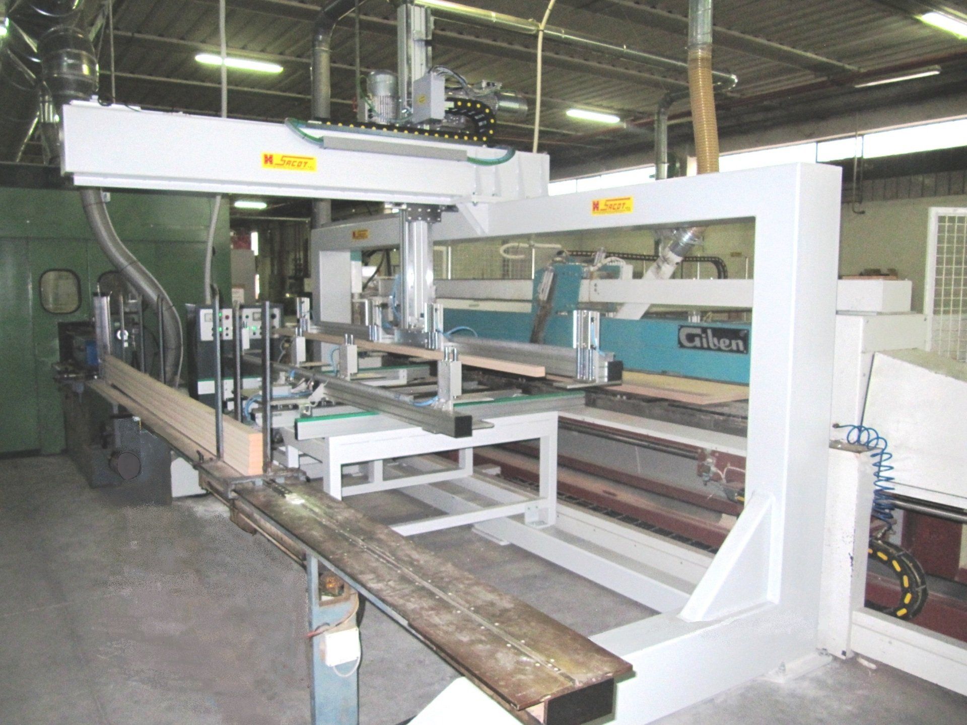 Collegamento sezionatrice-scorniciatrice