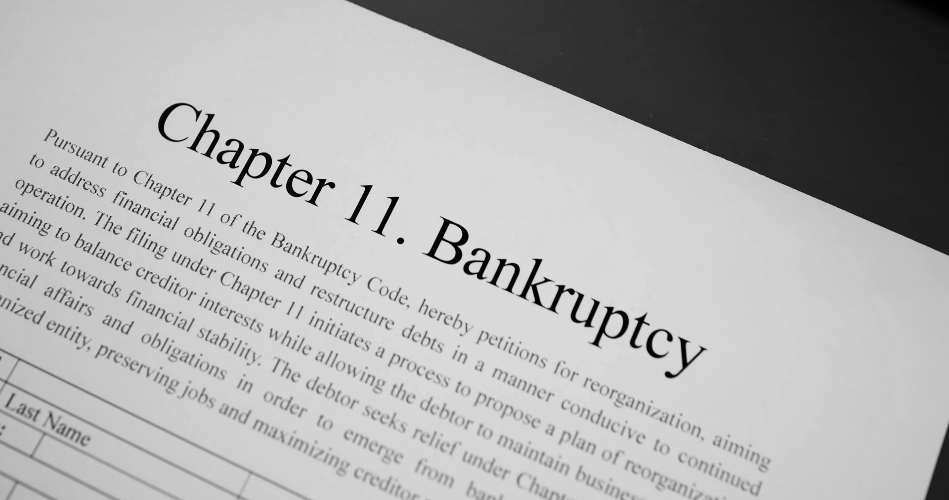 A piece of paper that says chapter 11 bankruptcy on it.