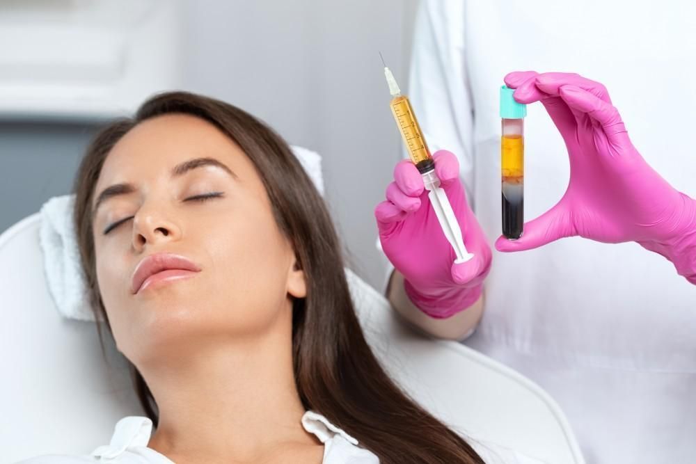 A woman is getting an injection in her face while a doctor holds a syringe.