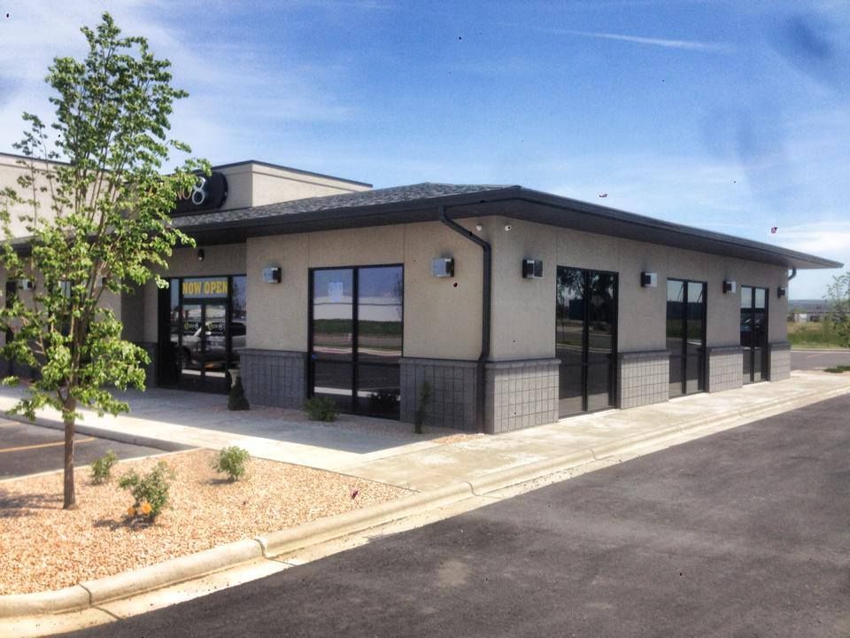 A building with a lot of windows and a sign that says ' a ' on it