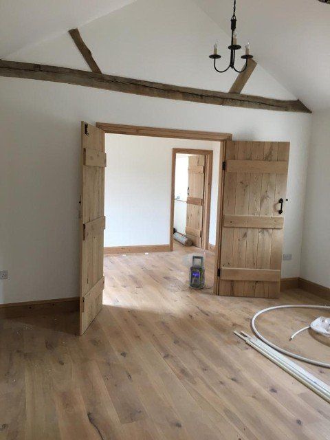 beautifully restored room with exposed timber beams
