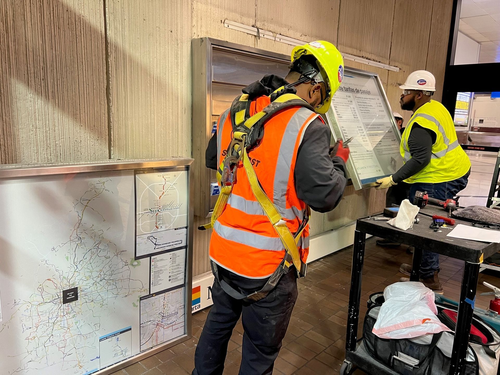 Two construction workers.