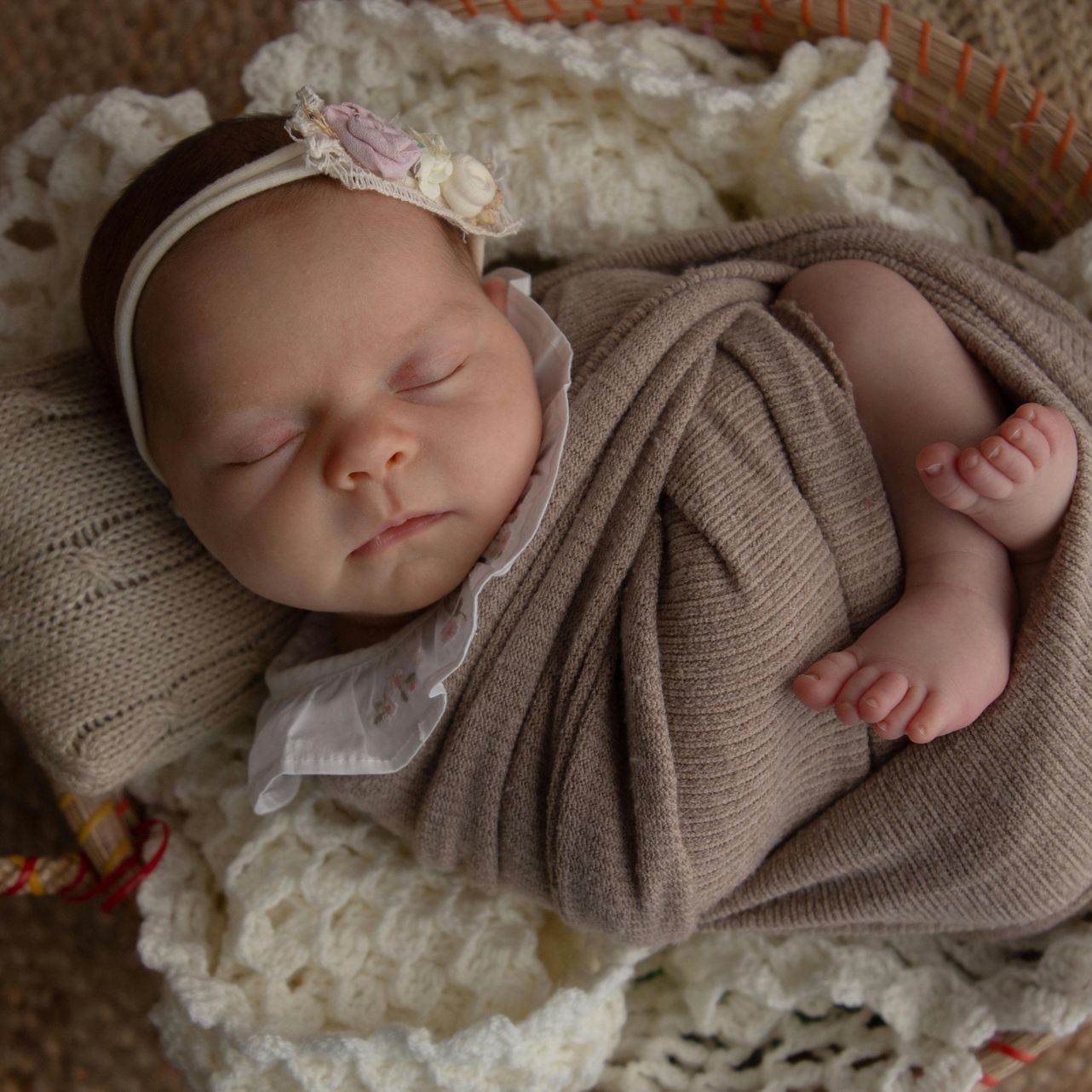 Image of beautiful swaddled infant sleeping.