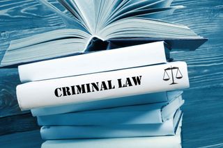 Criminal Law Book and Pen - Law Firm Serving in Cloquet, MN