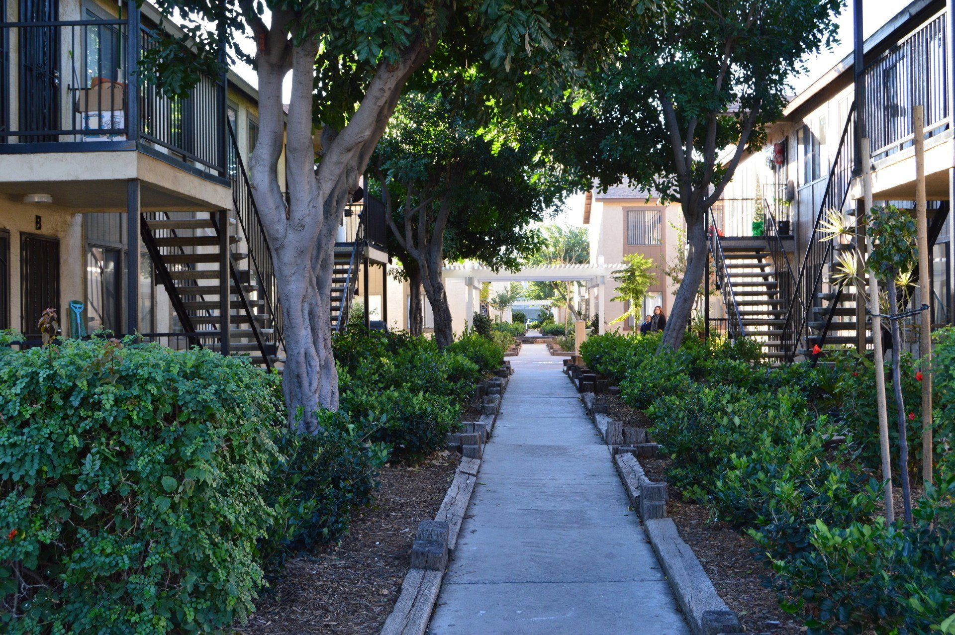 View of the walkway between the buildings at Park Haven Apartments
