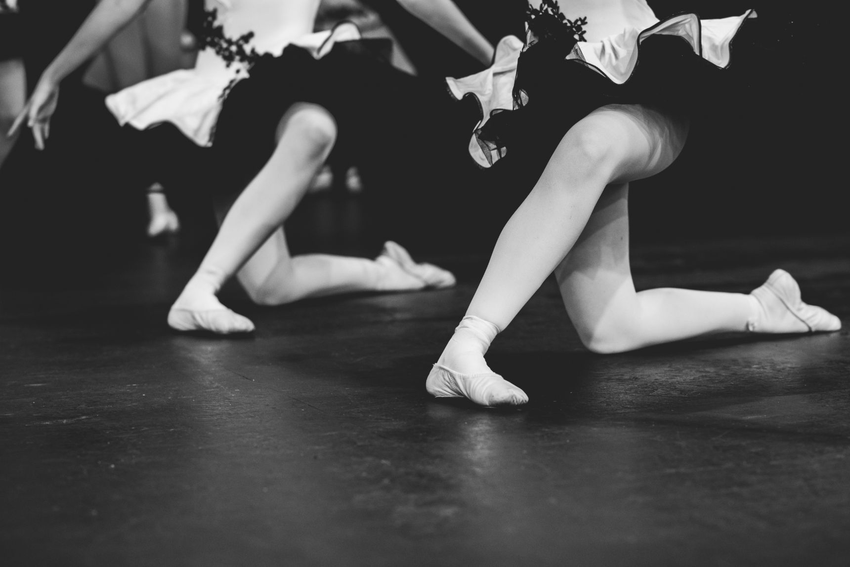 A black and white photo of a group of young girls dancing — Studi-O Dance School In Gateshead, NSW